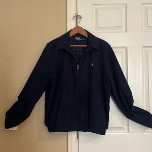 Dark blue zip down Polo jacket.